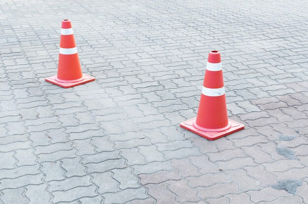 Chinese Girl Sits On Traffic Cone